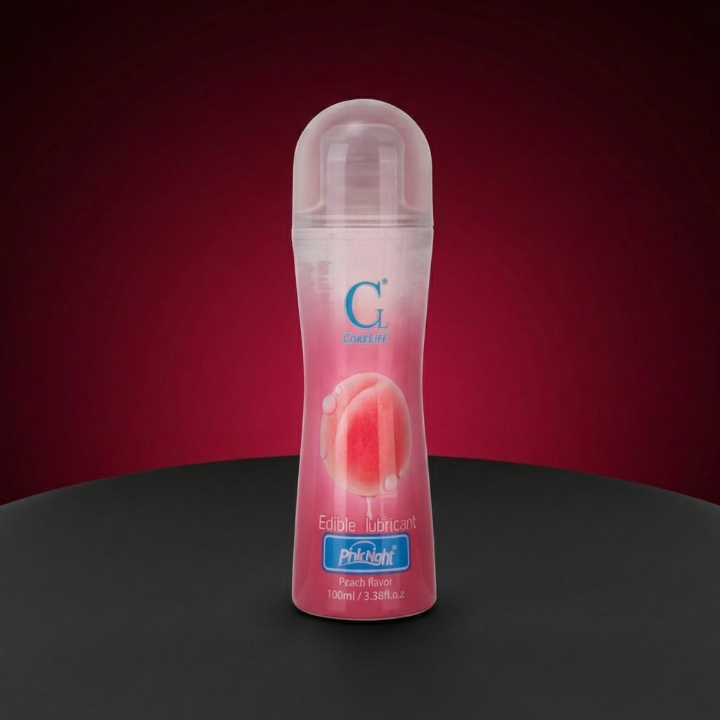 Lubrifiant intime Lovensia à base d'eau goût pêche, flacon de 100 ml, formule soyeuse et comestible pour un plaisir fruité.