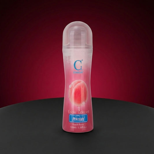 Lubrifiant intime Lovensia à base d'eau goût pêche, flacon de 100 ml, formule soyeuse et comestible pour un plaisir fruité.